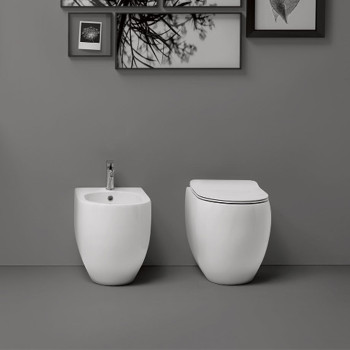 унитаз приставной БЕЗОБОДКОВЫЙ 52х36см, слив в стену, цвет: белый