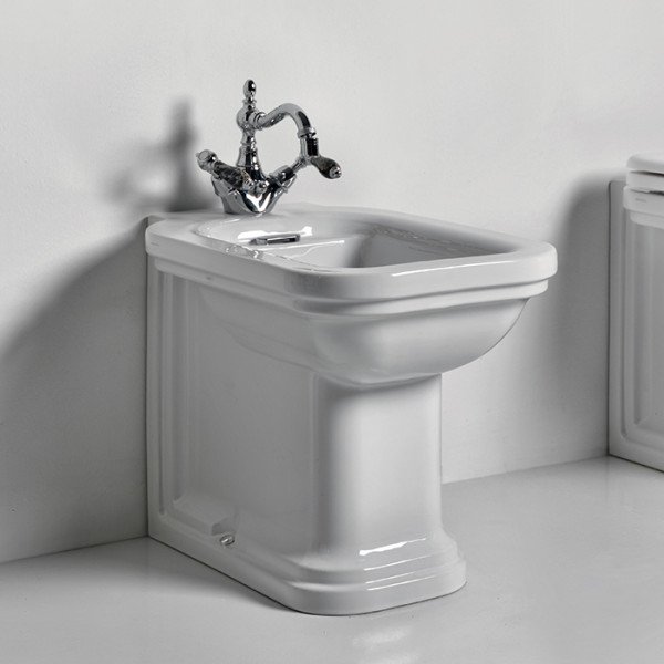 Биде напольное пристенное 55х37см с 1 отв. под смеситель, цвет: белый/хром. Фото 1