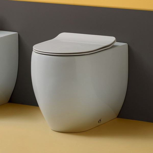 унитаз приставной 56см, цвет: белый. Фото 1